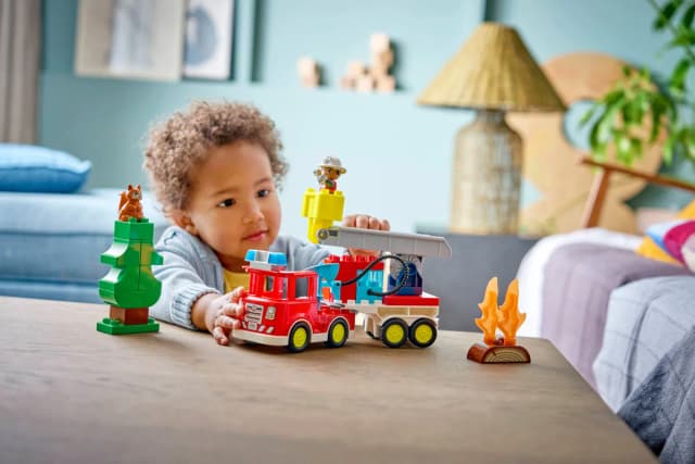 Fire Truck with Hose and Firefighter - Image 5