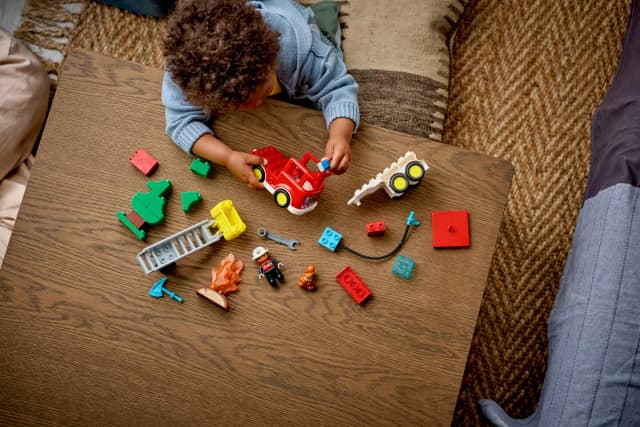 Fire Truck with Hose and Firefighter - Image 3