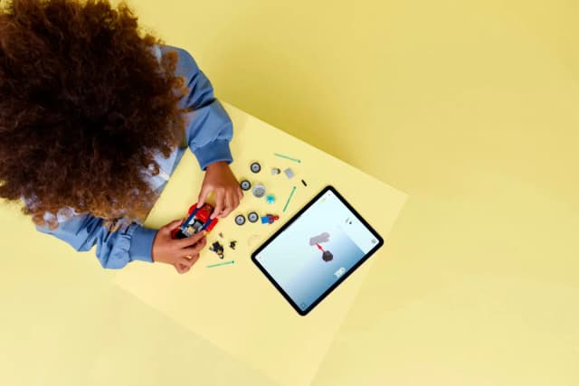 Spider-Man Car vs. Venomized Wolverine - Image 3